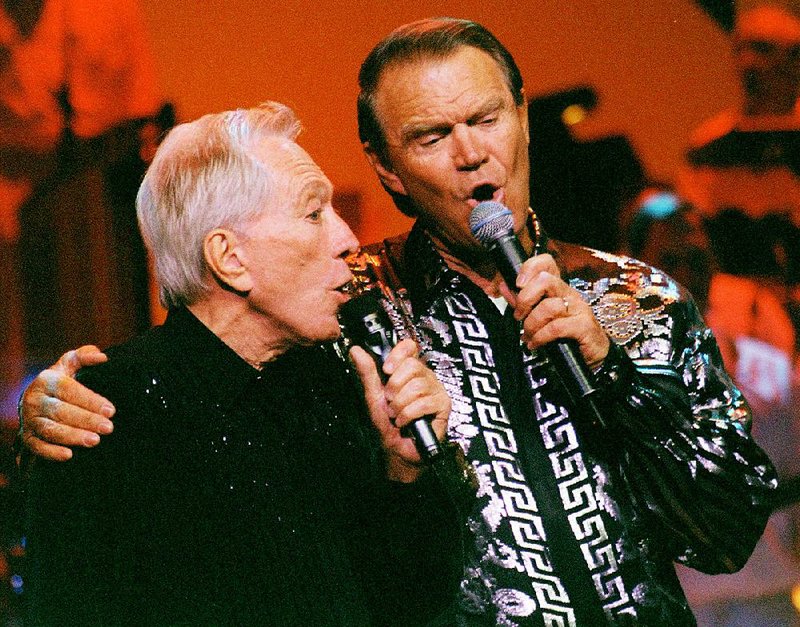 Andy Williams duets with Glen Campbell in a scene from the documentary, Glen Campbell: I’ll Be Me, which has just been released on DVD.
