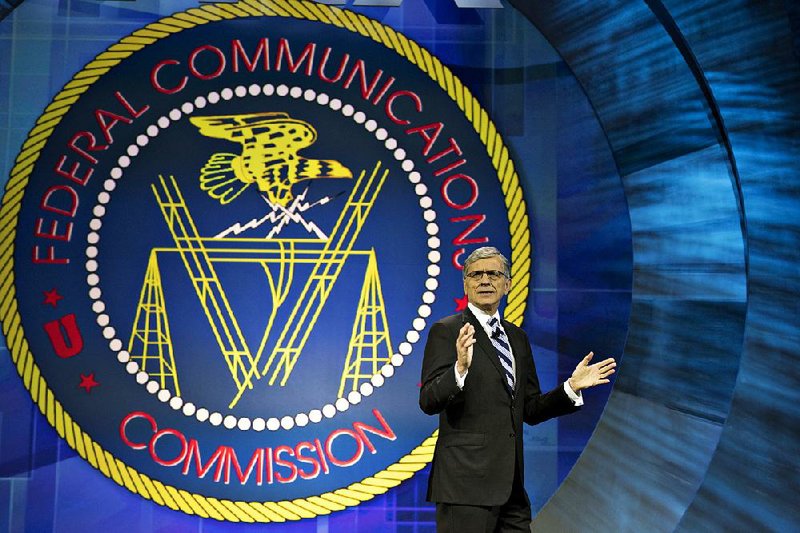 FCC Chairman Tom Wheeler, shown at a television expo in Chicago in May, has said his agency should act on behalf of consumers in disputes over programming fees. 