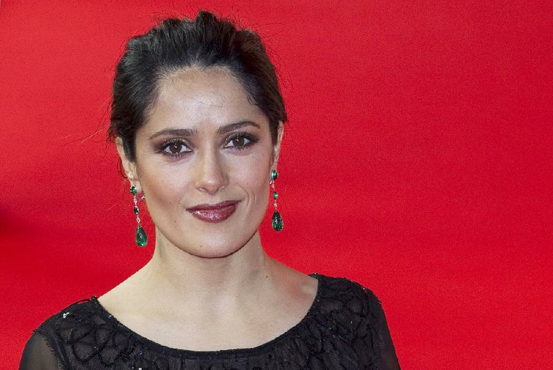 In this Feb. 15, 2012 file photo, actress Salma Hayek arrives for the screening of the film, "As Luck Would Have It " (La Chispa De La Vida), at the 62 edition of International Film Festival Berlinale, in Berlin. 