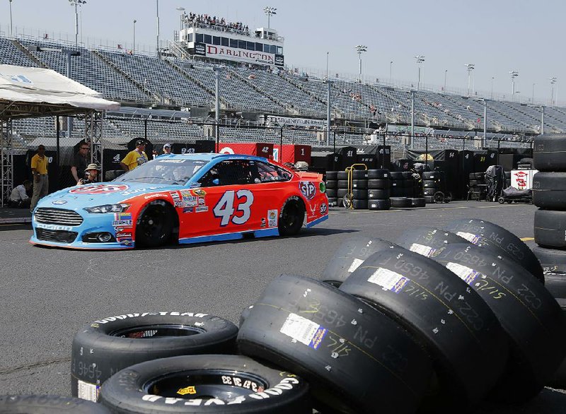 NASCAR Sprint Cup teams are utilizing vintage paint schemes for tonight’s Southern 500 at Darlington (S.C.) Raceway. Aric Almirola (43), with an STP scheme used by Richard Petty in the mid-1970s, will start 11th in tonight’s race. 