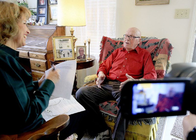 World War II veteran Arlis Owens talks about his time in the war Wednesday with Anita Deason before being interviewed for the Veterans History Project, a Library of Congress initiative that aims to collect firsthand accounts of American veterans from every conflict since World War I. Deason is the military liaison for U.S. Sen. John Boozman’s office. 