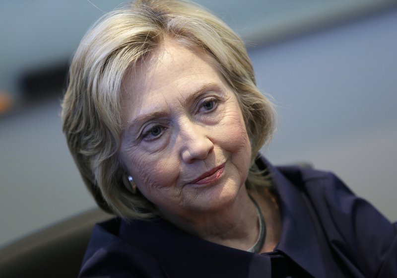 In this Sept. 7, 2015, photo, Democratic presidential candidate Hillary Rodham Clinton speaks during an interview with The Associated Press in Cedar Rapids, Iowa. Clinton says her use of a private email account was a "mistake," adding that she is "sorry" and takes responsibility for the decision.