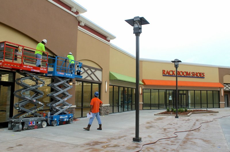 Construction continues Wednesday, Sept. 9, 2015, at Outlets of Little Rock ahead of the shopping center's Oct. 16 opening next to Bass Pro Shops Outdoor World near Interstates 30 and 430. 