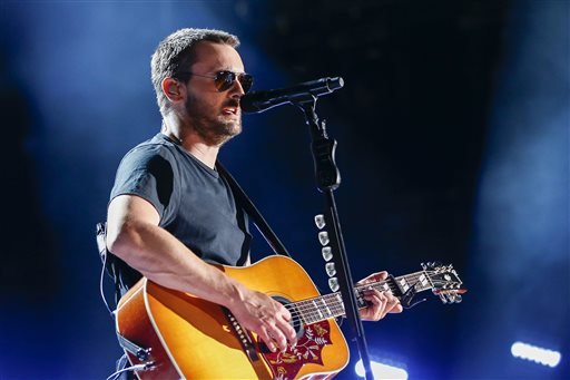 In a Sunday, June 14, 2015, file photo, Eric Church performs at LP Field at the CMA Music Festival in Nashville, Tenn. 