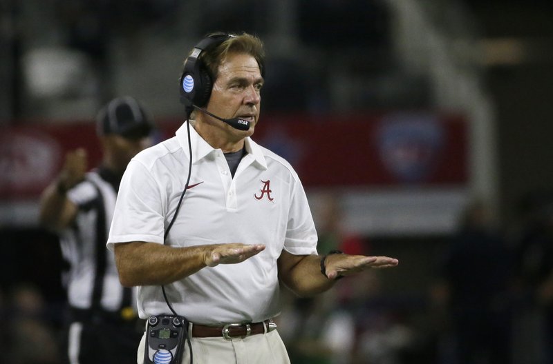 Alabama head coach Nick Saban gives directions from the sidelines during the first half of an NCAA college football game against Wisconsin, Saturday, Sept. 5, 2015, in Arlington, Texas. (AP Photo/LM Otero)