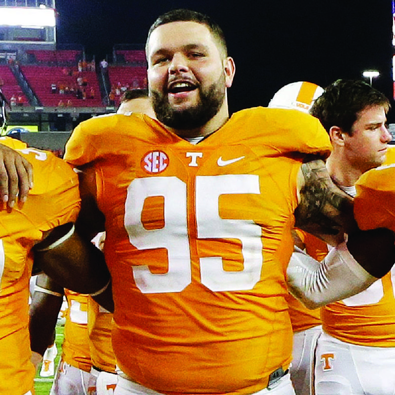 In this Sept. 5, 2015, photo, Tennessee defensive lineman Danny O'Brien (95) sings with his teammates following the Vols' 59-30 win over Bowling Green in Nashville. 