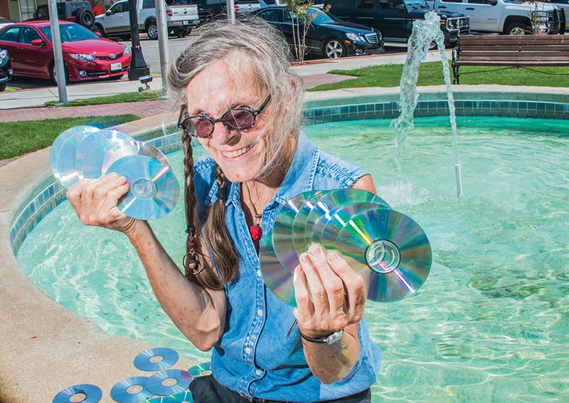 Alice Guffey Miller of Monticello will create a community sculpture made from recycled CDs and DVDs in the fountain at Simon Park as part of Conway ArtsFest, which will begin Sept. 26 and continue through Oct. 3. At the conclusion of ArtsFest, the sculpture will be used at EcoFest in Laurel Park on Oct. 10 and finally will be installed at the Metro Square Plaza under development by Salter Properties in front of Regions Bank in downtown Conway.