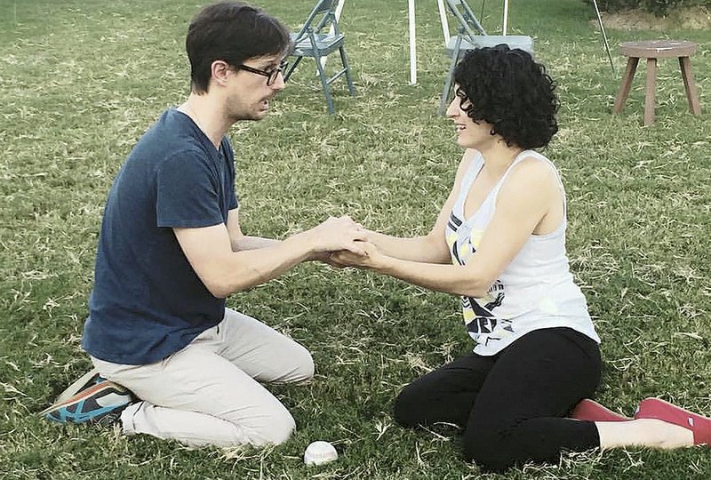 Brian and Liz McCue rehearse for the Classical Edge production of “A Midsummer Night’s Dream,” which will be presented outdoors in Bentonville’s Lawrence Plaza.