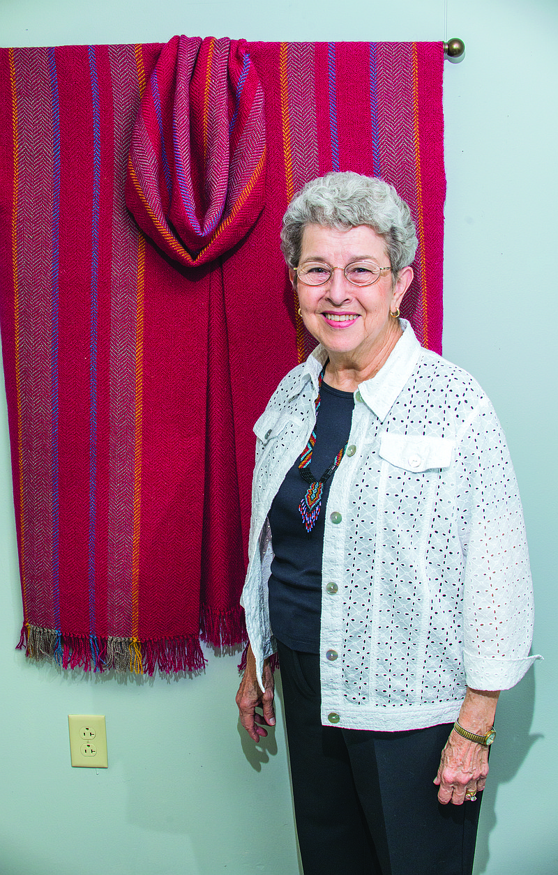 Evelyn Good of Arkadelphia displays this cape of hand-woven wool in the Art Educators’ Show and Sale at the Arkadelphia Arts Center. Good retired in 2007 as a family and consumer science instructor at Henderson State University. In addition to textiles, Good also paints in watercolor and oils.
