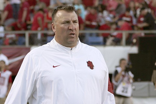 Arkansas head coach Bret Bielema leaves the field after an NCAA college football game against Toledo in Little Rock, Ark., Saturday, Sept. 12, 2015. Toledo defeated Arkansas 16-12. (AP Photo/Danny Johnston)
