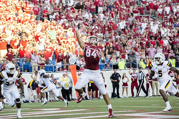 A pass sails over the outstretched hand of Arkansas junior tight end Hunter Henry on a third-down pass attempt on Saturday, Sept. 12, 2015, on the Razorbacks' final possession against Toledo at War Memorial Stadium in Little Rock.