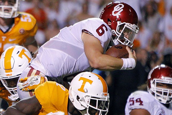 Oklahoma quarterback Baker Mayfield (6) scores a touchdown during double overtime of an NCAA college football game against Tennessee, Saturday, Sept. 12, 2015 in Knoxville, Tenn. Oklahoma won 31-24. (AP Photo/Wade Payne)