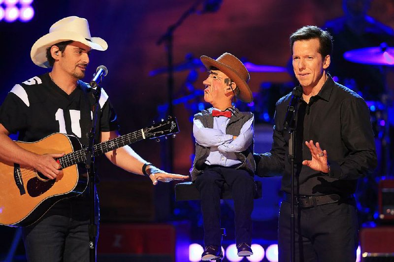 Jeff Dunham stars in a new TV special at 7 p.m. today on NBC. Dunham is shown with guest star Brad Paisley and Walter.
