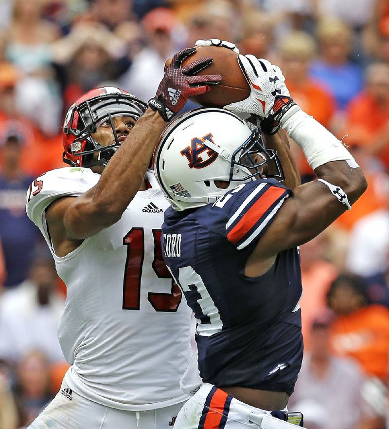 Defensive back Johnathan Ford (front) and the Auburn Tigers may not have struggled so much with Jacksonville State last weekend if it hadn’t been for the early start time, which one Alabama state senator wants to abolish. 