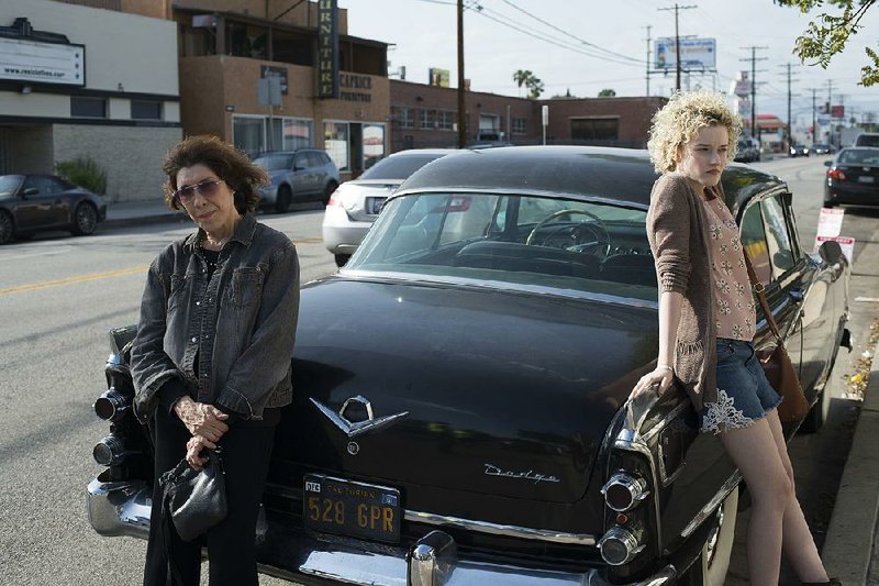 Elle (Lily Tomlin, left) takes a journey through her past in Paul Weitz’s bittersweet indie comedy Grandma.
