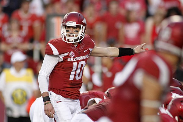 Arkansas' Brandon Allen calls out a play during the first half of an NCAA college football game against Texas Tech, Saturday, Sept. 19, 2015, in Fayetteville, Ark. (AP Photo/Samantha Baker)