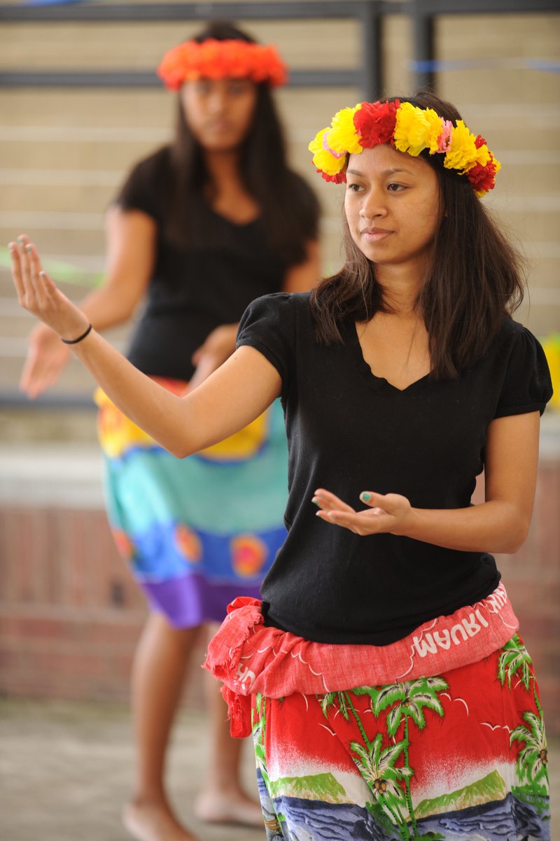 Lillian Chonggum of Springdale dances a traditional Marshallese dance Saturday, during Welcoming NWA: Celebrating the Cultural Diversity of Northwest Arkansas in Springdale.