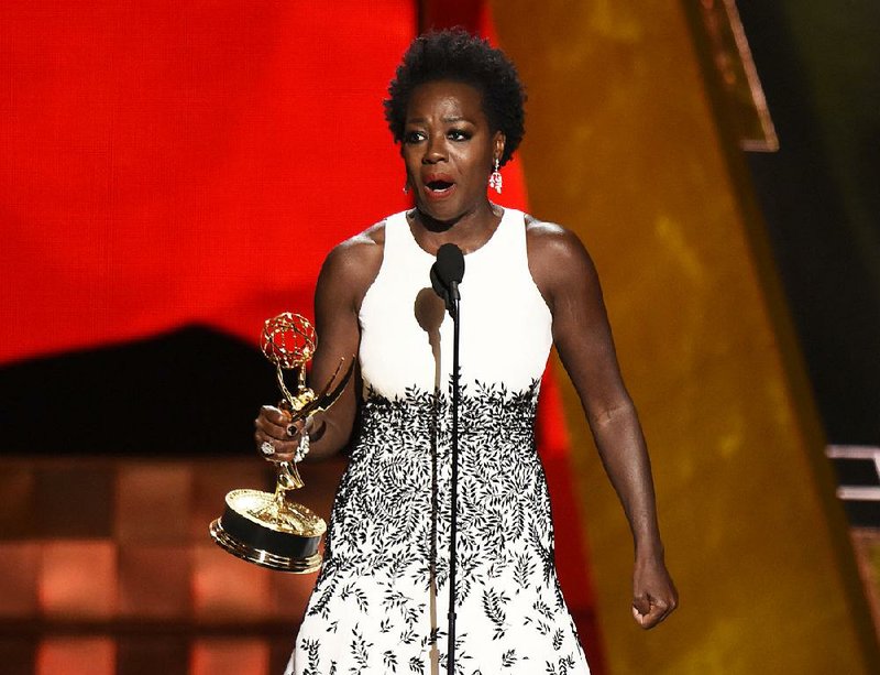 Viola Davis accepts the award for outstanding lead actress in a drama series for How to Get Away With Murder at the 67th Primetime Emmy Awards on Sunday in Los Angeles.