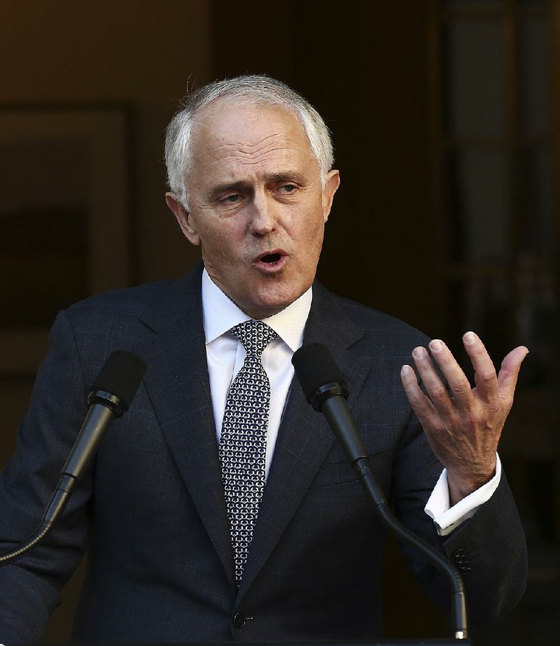 Australian Prime Minister Malcolm Turnbull announces his new Cabinet during a news conference at Parliament
House in Canberra, Australia, on Sunday.