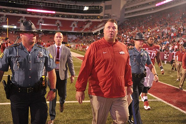 Arkansas coach Bret Bielema walks off the field following the Razorbacks' 35-24 loss to Texas Tech on Saturday, Sept. 19, 2015, at Razorback Stadium in Fayetteville. 