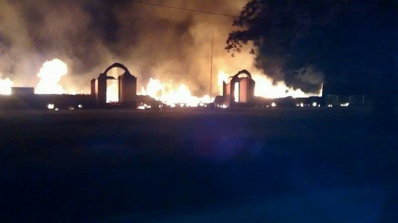 The old Burdette school is shown burning early Sunday morning.