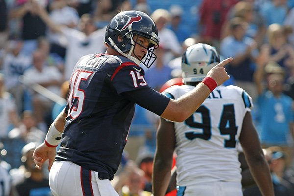 Houston Texans' Ryan Mallett (15) directs his team against the Carolina Panthers during the second half of an NFL football game in Charlotte, N.C., Sunday, Sept. 20, 2015. The Panthers won 24-17. (AP Photo/Bob Leverone)