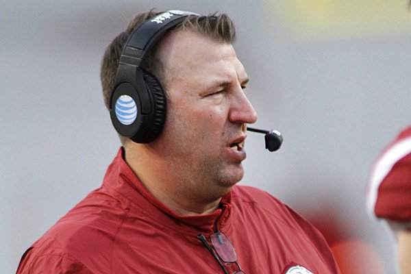 Arkansas head coach Bret Bielema talks to his players during the first half of an NCAA college football game against Texas Tech, Saturday, Sept. 19, 2015, in Fayetteville, Ark. (AP Photo/Samantha Baker)