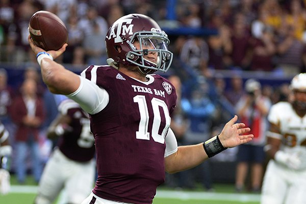 Texas A&M quarterback Kyle Allen (10) passes against Arizona State during the first half of an NCAA college football game Saturday, Sept. 5, 2015, in Houston. (AP Photo/George Bridges)
