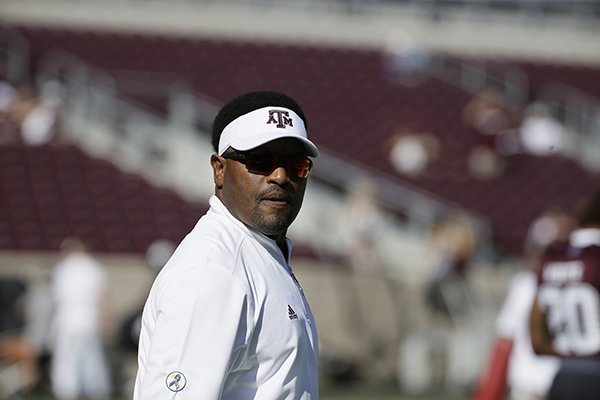 Texas A&M coach Kevin Sumlin walks onto the field before an NCAA college football game against Nevada Saturday, Sept. 19, 2015, in College Station, Texas. (AP Photo/David J. Phillip)