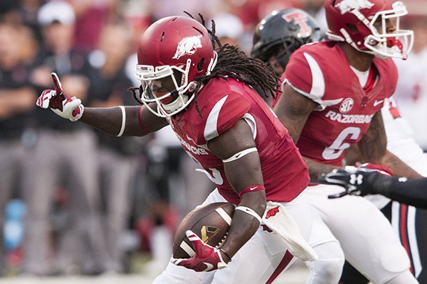 Arkansas running back Alex Collins scores a touchdown during a game against Texas Tech on Saturday, Sept. 19, 2015, at Razorback Stadium in Fayetteville. 
