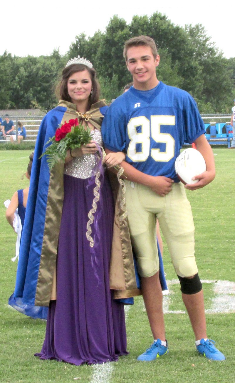 Photo by Mike Eckels Celine Prelle (left) and Tyler Riddle were crowned 2015 Bulldog homecoming queen and king during the Decatur - Mountainburg game at Bulldog Stadium in Decatur Sept. 18.