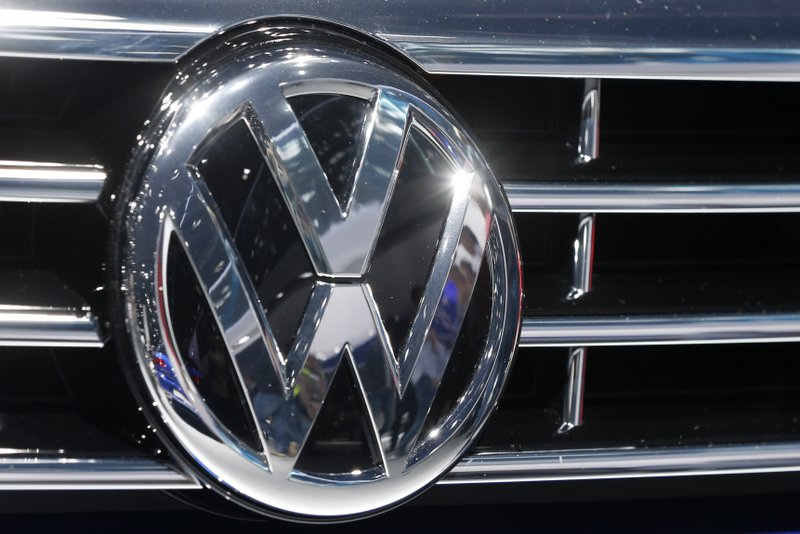 The VW Logo is photographed at a car  at the Car Show in Frankfurt, Germany, Tuesday, Sept. 22, 2015. Volkswagen has   admitted that it intentionally installed software programmed to switch engines to a cleaner mode during official emissions testing.