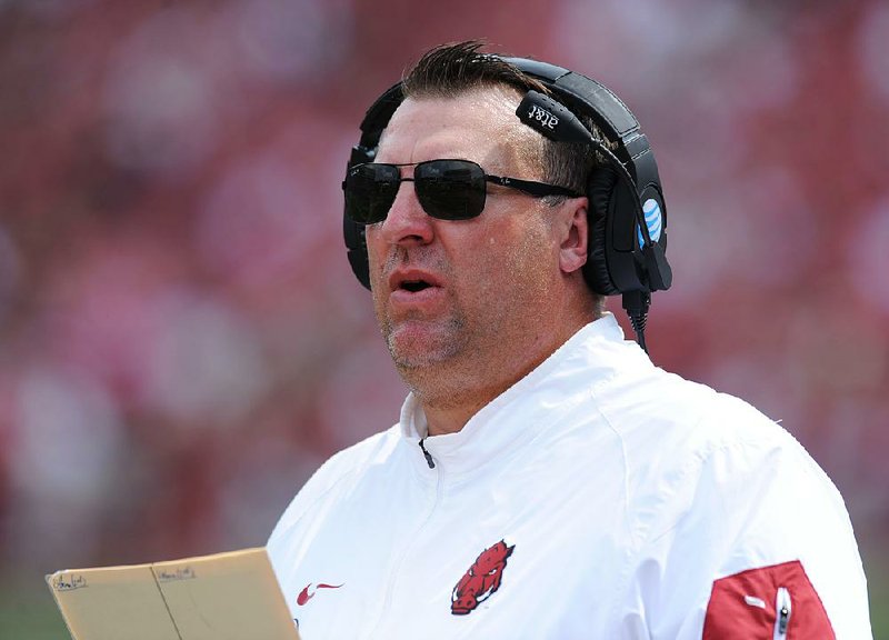 Arkansas Coach Bret Bielema was called a dinosaur by one Los Angeles Times columnist, who said Bielema believes “football is won in increments of inches and blood drops.” 