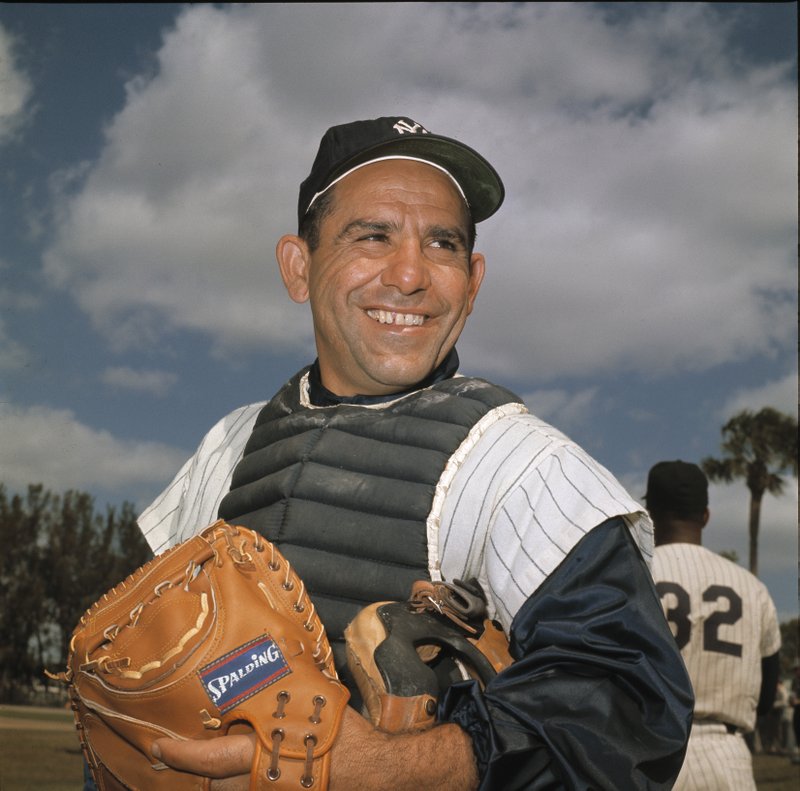 MR. OCTOBER: Yogi Berra, who died Tuesday at age 90, played on 14 American League championship teams in 18 years with the New York Yankees, later managing both the Yankees and crosstown Mets to the World Series.