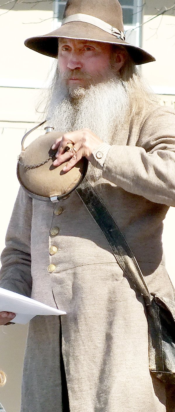 File Photo Steve Bailey, a private in the Northwest 15th Arkansas Infantry, participates in the 2012 Civil War battle reenactment on the Bentonville square, the first of the Arkansas Reenactor Education Association's events. The second event will be held this weekend on the Kent Webb farm on the Arkansas-Missouri state line north of Pea Ridge.