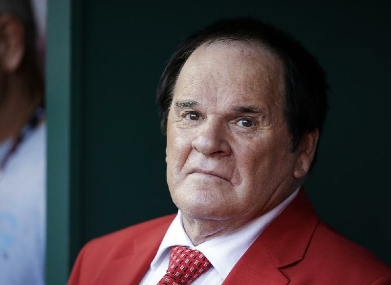 FILE - In this July 14, 2015, file photo, Pete Rose waits to be introduced before the MLB All-Star baseball game in Cincinnati.  (AP Photo/John Minchillo)