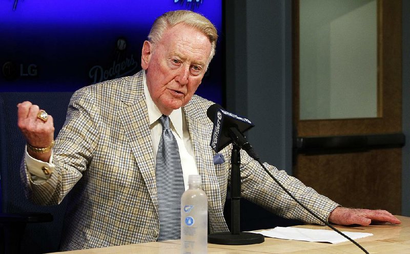 Broadcaster Vin Scully has two entries in the Guinness World Records, one coming early in his career and one later. 