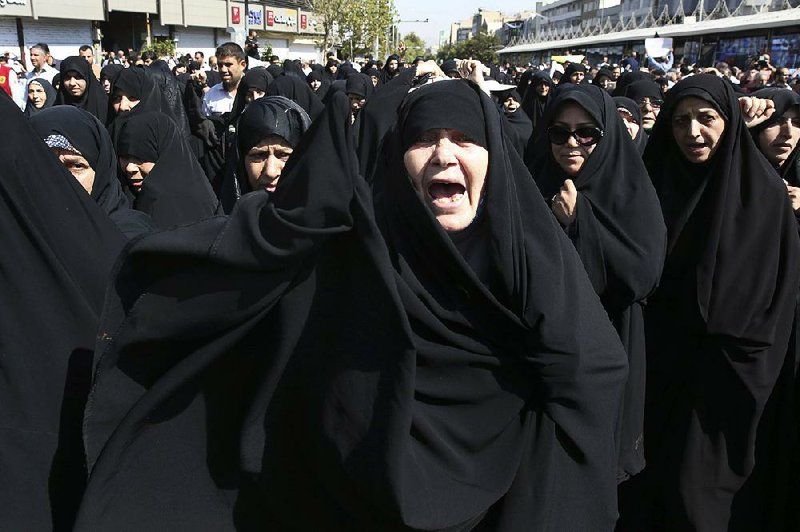 Iranians gather Friday in Tehran to protest over the hajj deaths, blaming Saudi Arabia.
