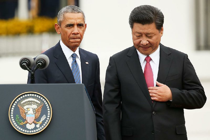 President Barack Obama and Chinese President Xi Jinping take the stage together during the arrival ceremony Friday for Xi on the South Lawn of the White House.
