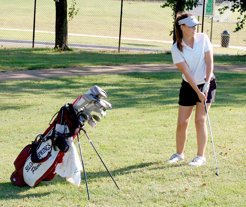 Graham Thomas/Siloam Sunday Siloam Springs senior golfer Amanda Glass has found a way to balance a hectic schedule filled with sports, clubs, band and church. Glass will play in her fourth Class 6A State Girls Golf Tournament on Monday for the Lady Panthers. The tournament will be held at Big Creek Golf and Athletic Club in Mountain Home.