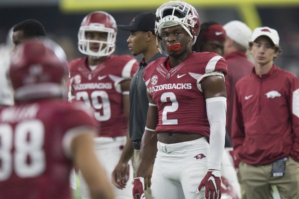 Arkansas defensive back D.J. Dean stands on the sideline during the Razorbacks' overtime loss to No. 14 Texas A&M on Saturday, Sept. 26, 2015, at AT&T Stadium in Arlington, Texas.