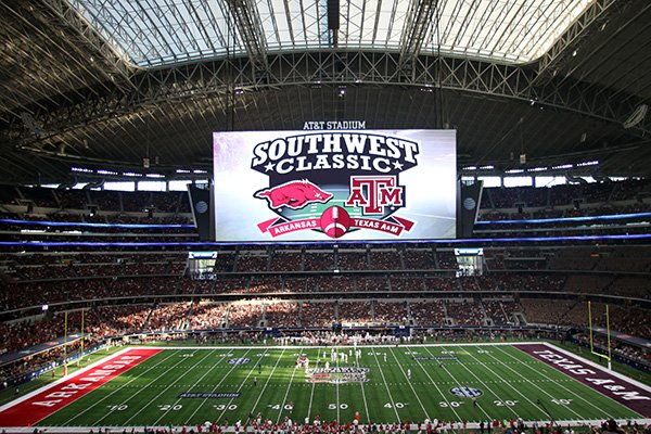 Arkansas and Texas A&M play during the first half of an NCAA college football game Saturday, Sept. 26, 2015, in Arlington, Texas. (AP Photo/Roger Steinman)