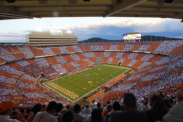 Fans create the checker board in the stands during the first half of an NCAA college football game between Tennessee and Oklahoma Saturday, Sept. 12, 2015 in Knoxville, Tenn. (AP Photo/Wade Payne)