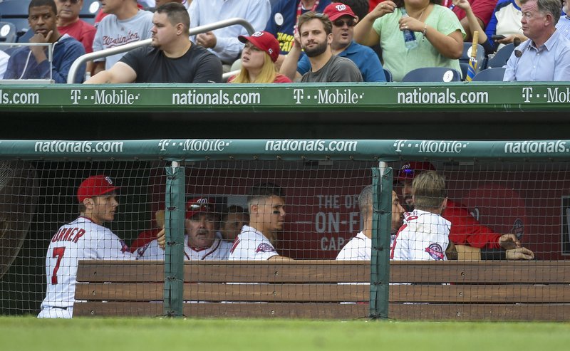 Washington Nationals' Bryce Harper and Jonathan Papelbon fight in the dugout in the eighth inning of a baseball game against the Philadelphia Phillies, Sunday, Sept. 27, 2015, in Washington.