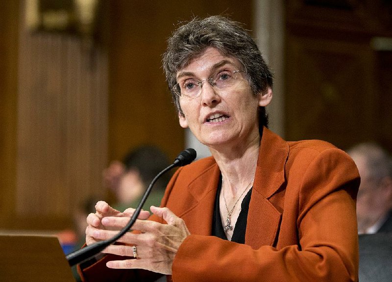 Janet McCabe, the Environmental Protection Agency’s top air regulator, testifi es Tuesday on Capitol Hill in Washington. 
