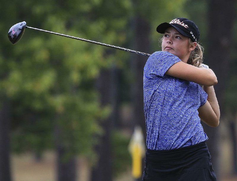Brooke Matthews of Rogers shot a 1-under-par 71 for the second consecutive day to earn medalist honors at the Class 7A girls golf state tournament Wednesday at Conway Country Club. 