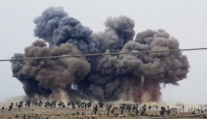 Smoke billows Thursday in Kafr Nabel after Russian warplanes carried out a second day of strikes in Syria. 