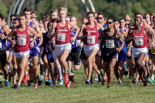 Arkansas runners begin the collegiate 8K on Saturday, Oct. 4, 2014, during the 26th annual Chile Pepper Cross Country Festival at Agri Park in Fayetteville.