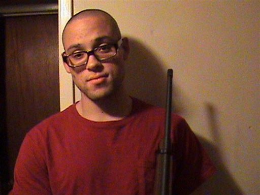 This undated photo from a MySpace page that appeared to belong to Christopher Sean Harper-Mercer shows him holding a rifle. Authorities identified Mercer as the gunman who went on a deadly shooting rampage at Umpqua Community College in Roseburg, Ore., on Thursday, Oct. 1, 2015.