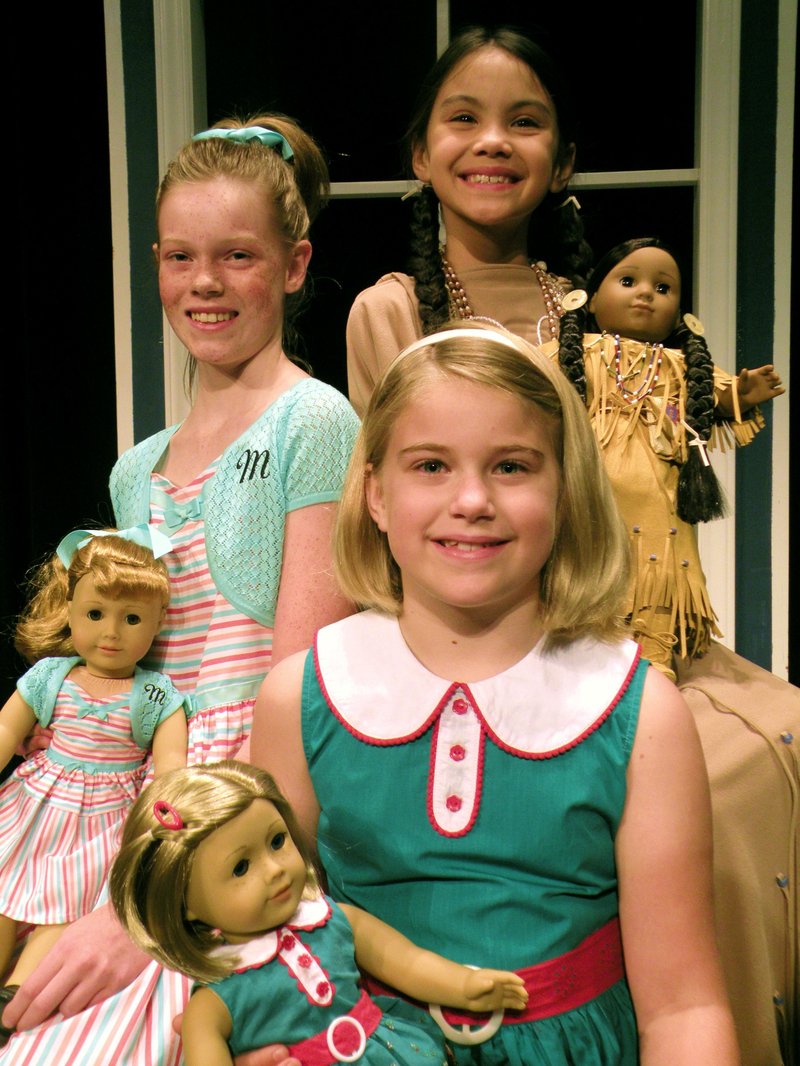 Among the youngsters appearing as American Girls during this weekend’s fashion shows are Halle Sewell, front, Anna Bisbee and Madeline Xaysanasy. 